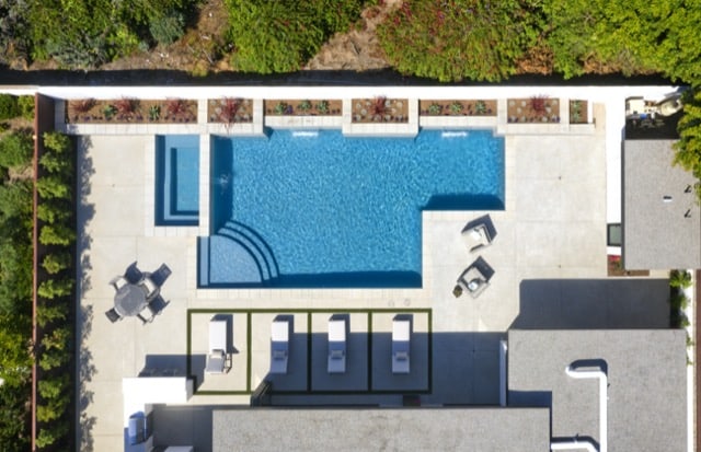 This pool in a home designed by Payton Addison Interior Design Atelier illustrates life on the California Coast.